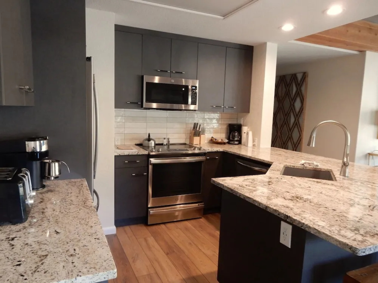 2 Br  With Huge, Sectional Couch 2 Bedroom Condo - No Cleaning Fee! by RedAwning