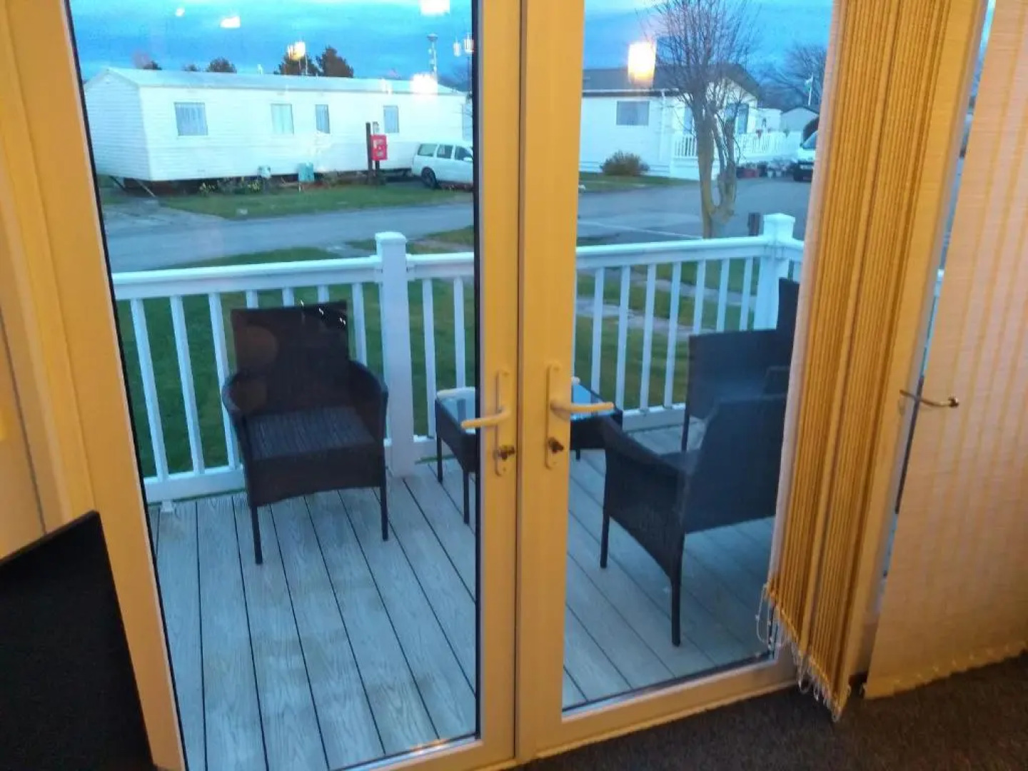 E3 is a 2 Bedroom 6 berth Lodge on Whitehouse Leisure Park in Towyn near Rhyl with Free WiFi, decking and private parking space