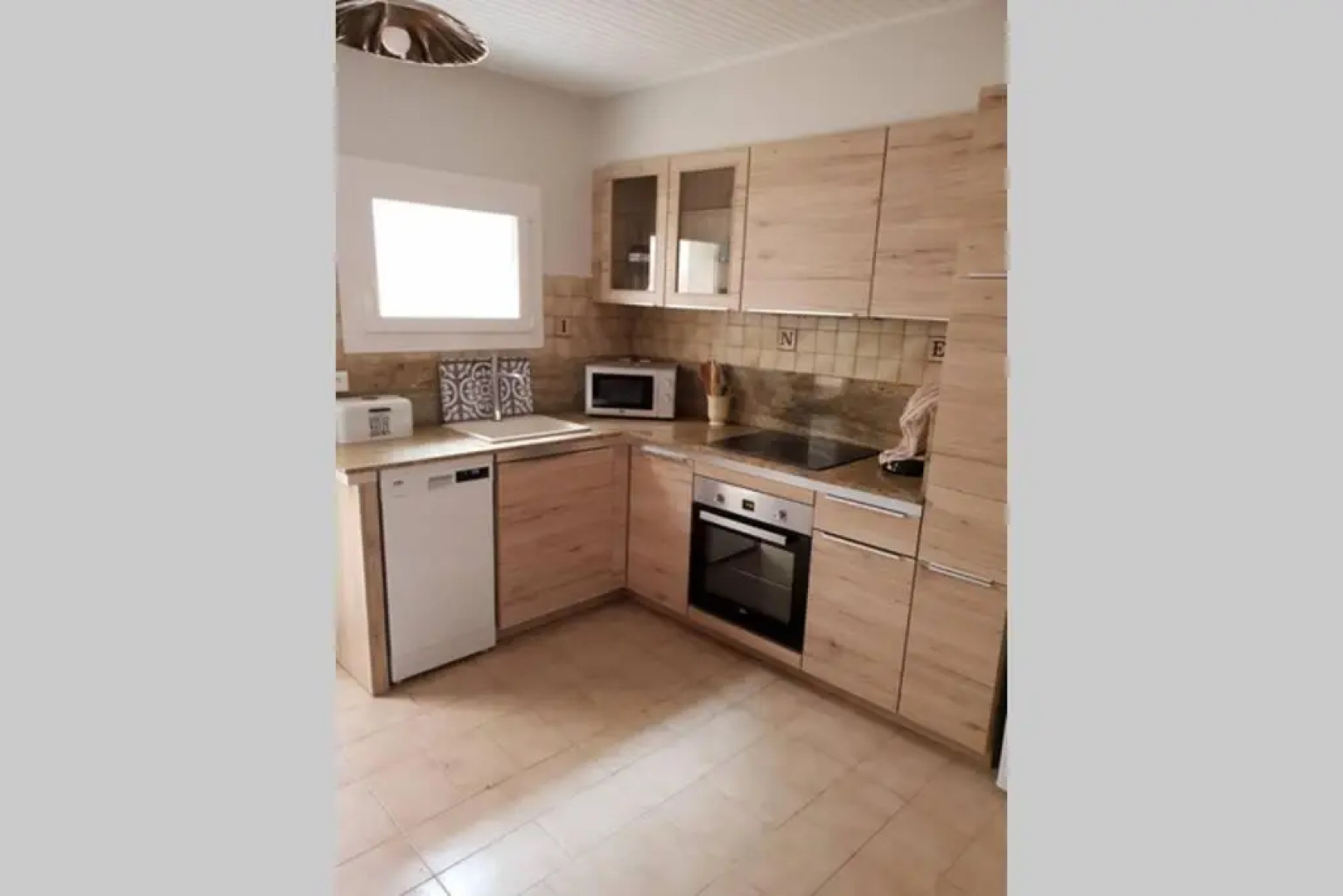 Charmante maison de ville F3 avec garage et cour