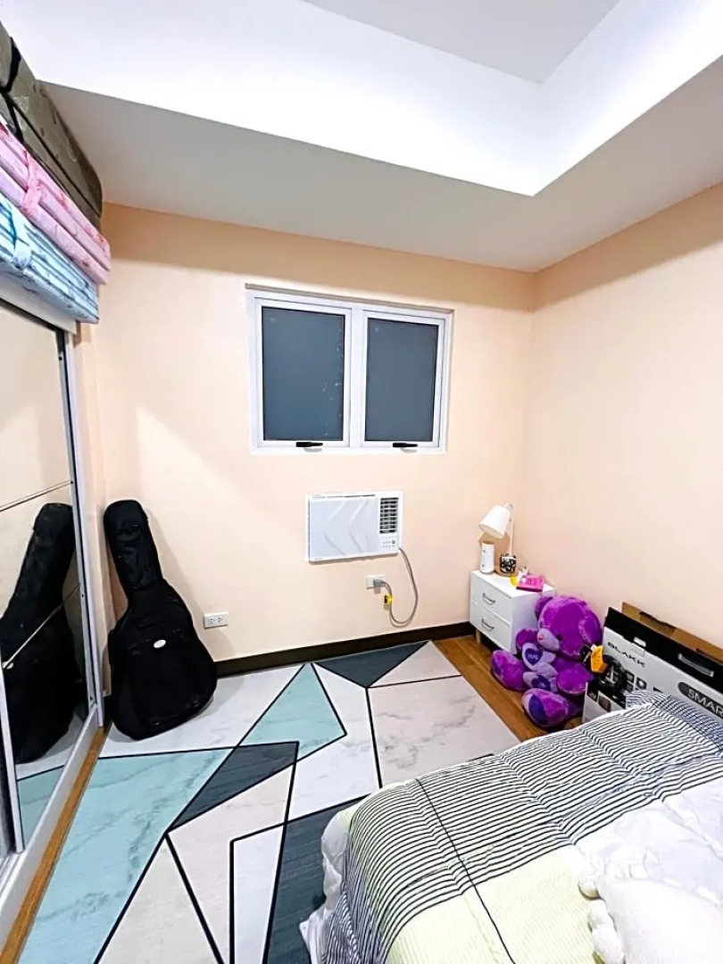 New Cozy 2 bedroom unit condotel for staycation with living room and kitchen set with pool