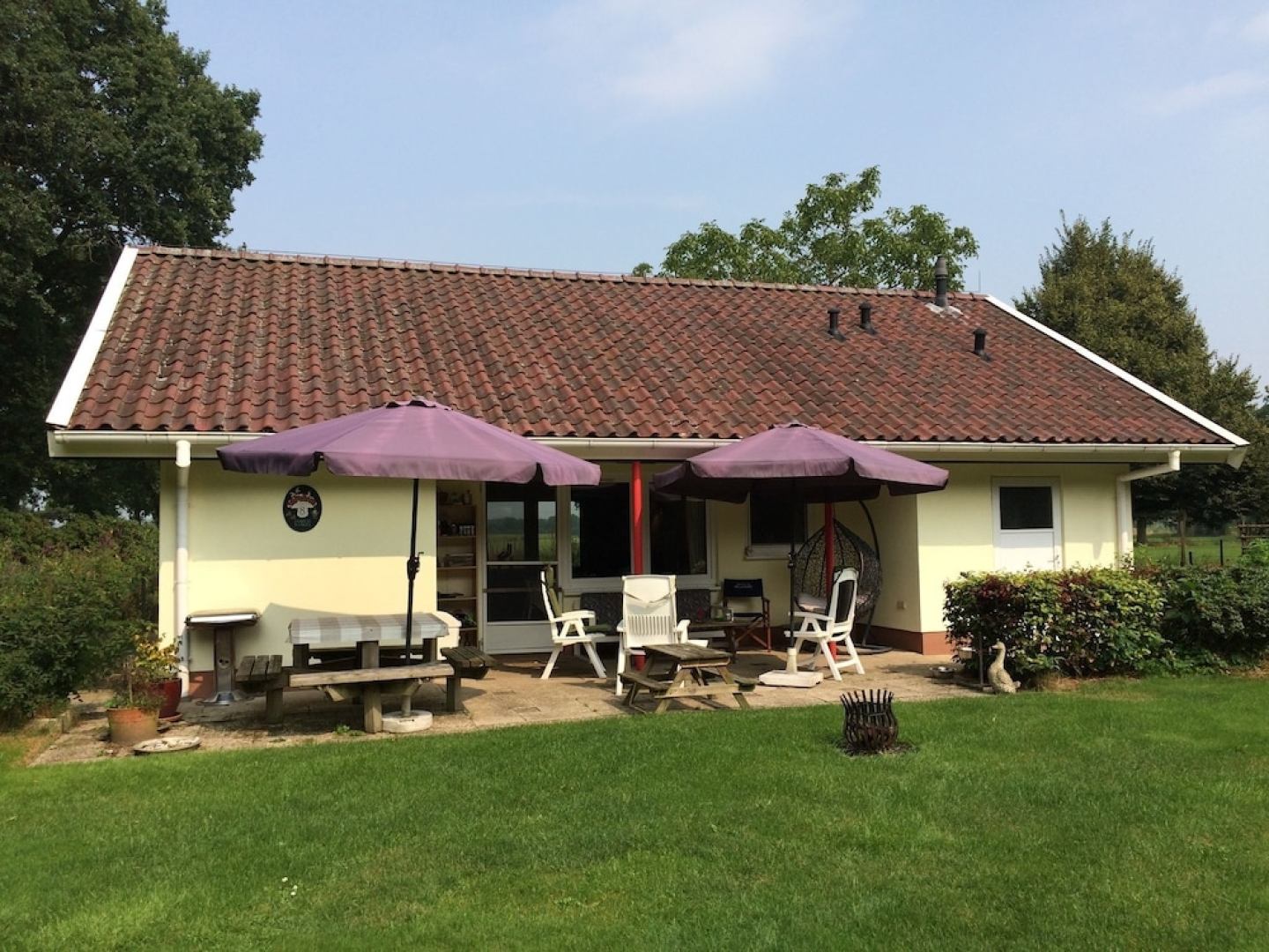Detached house with large enclosed garden, playground equipment and covered terrace