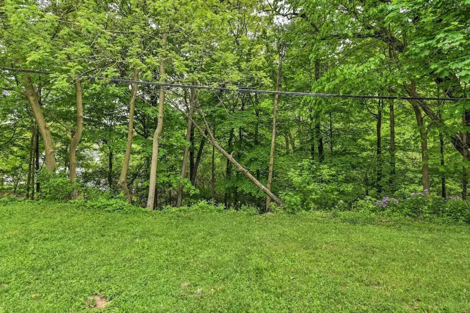 Walkable Lake Elkhart Apt: Dine, Shop, Swim!