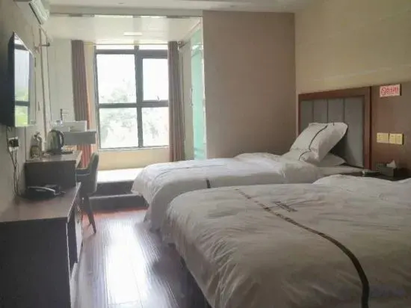 Yuechi Jintai Business Hotel