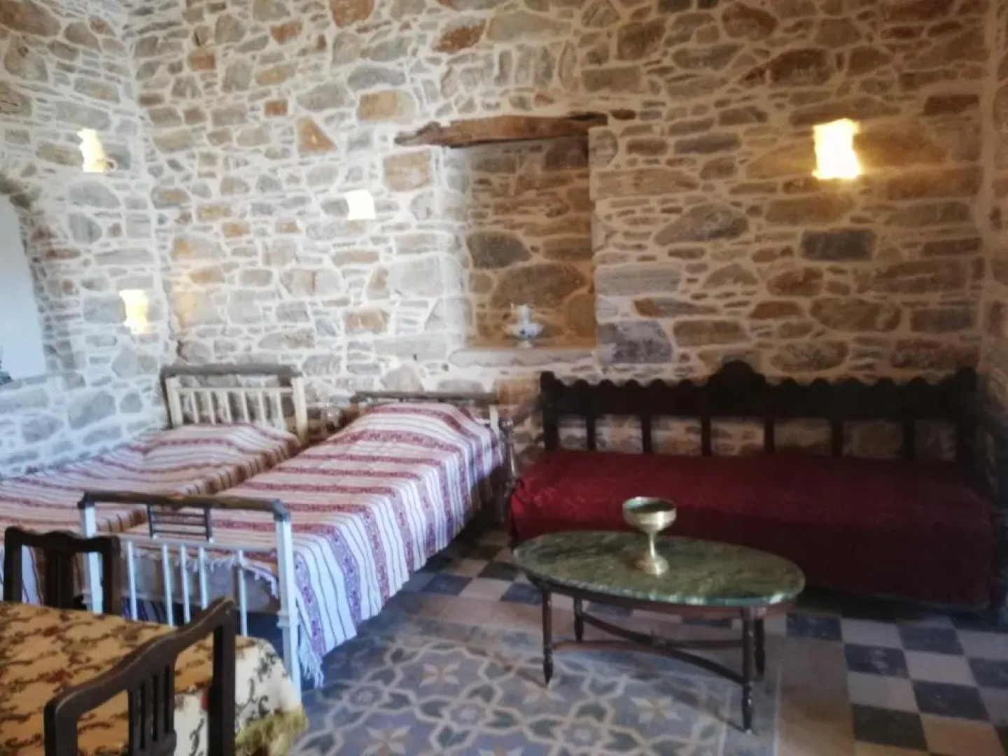 "Fasolas square house" is located 30 stairs up from the main road and it is in the old market "fasolas" and next to the museums