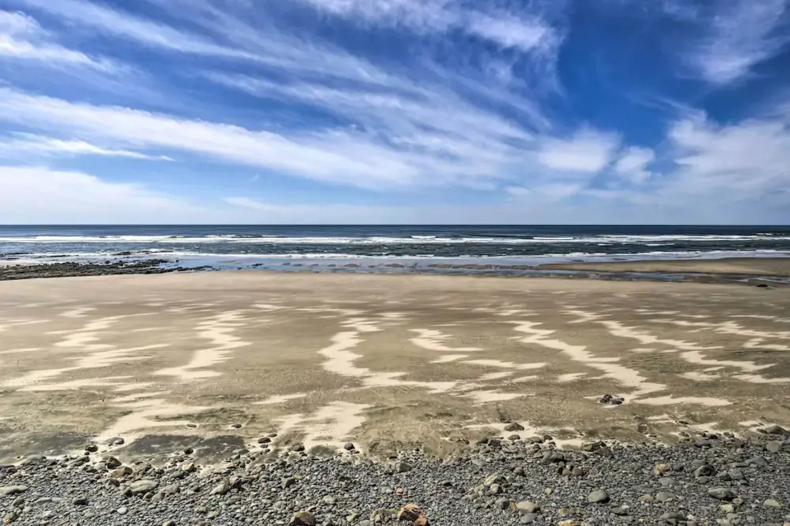 Chic Beachfront Abode w/ Balcony & Beach Access!