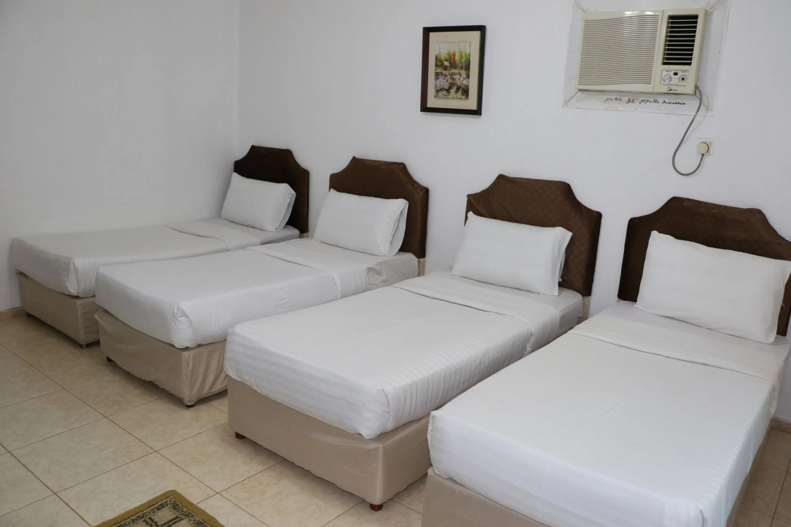 Al Alya Hotel Rooms and Suites