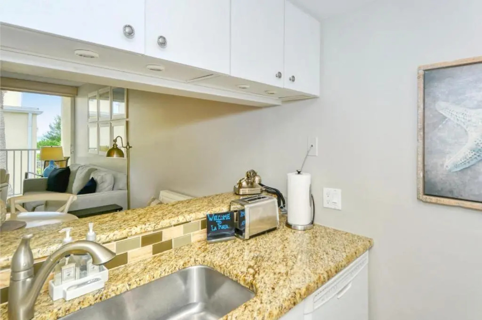 LaPlaya 202E Catch the gentle Gulf breezes on your private balcony beneath the swaying palms