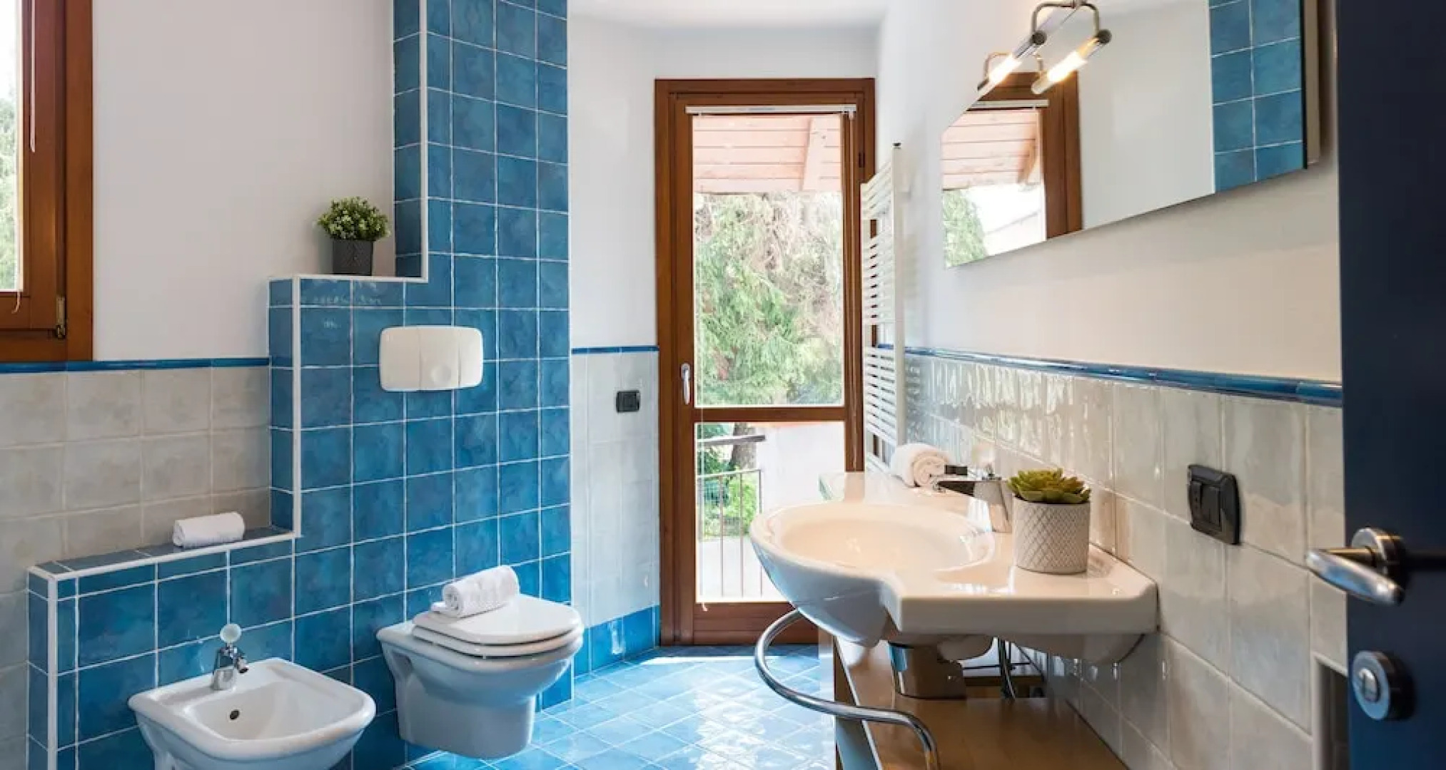 JOIVY Scenic 2BR Apt w/ Balcony & Parking