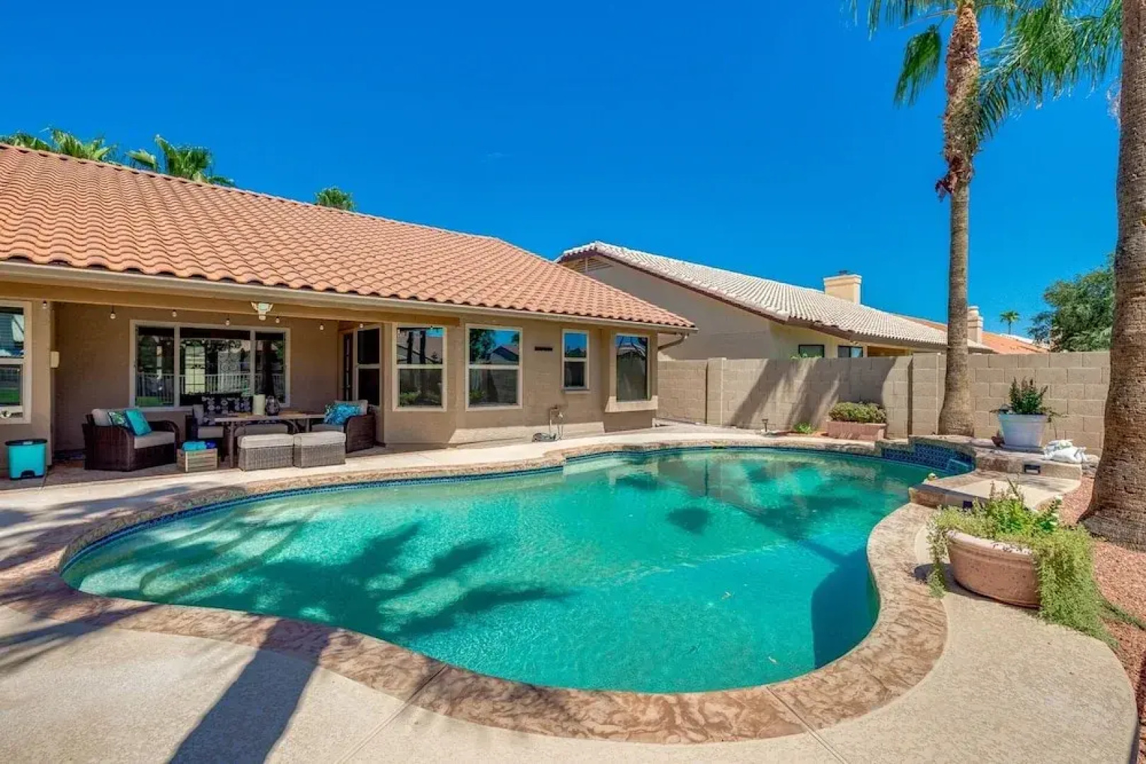 Updated Waterfront Home W/ Private Heated Pool & Garage. Near Arrowhead Shops! By Redawning