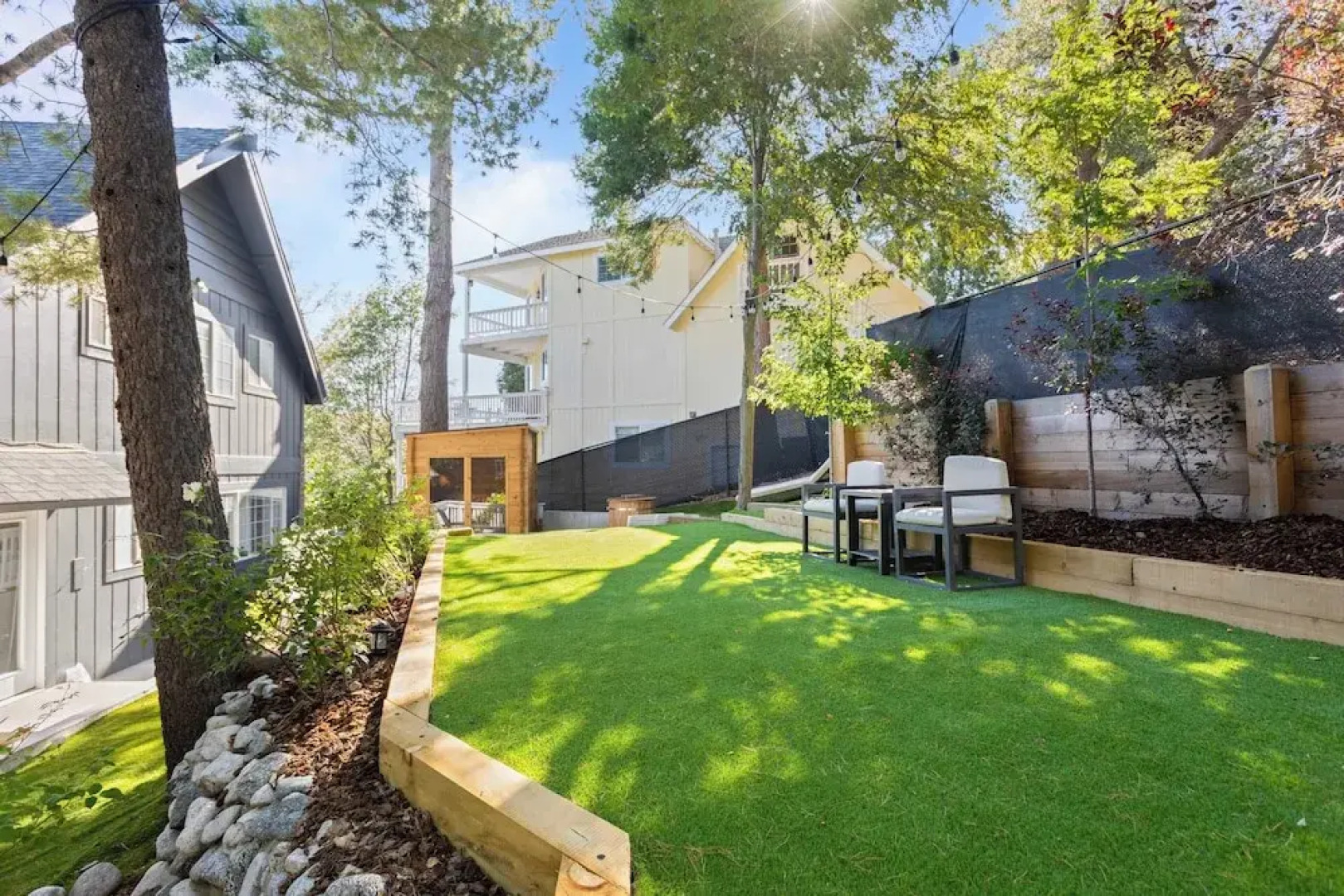 Sauna, Lake Views + Firepits Walk to Lake & Trails Zurich Drive by Avantstay