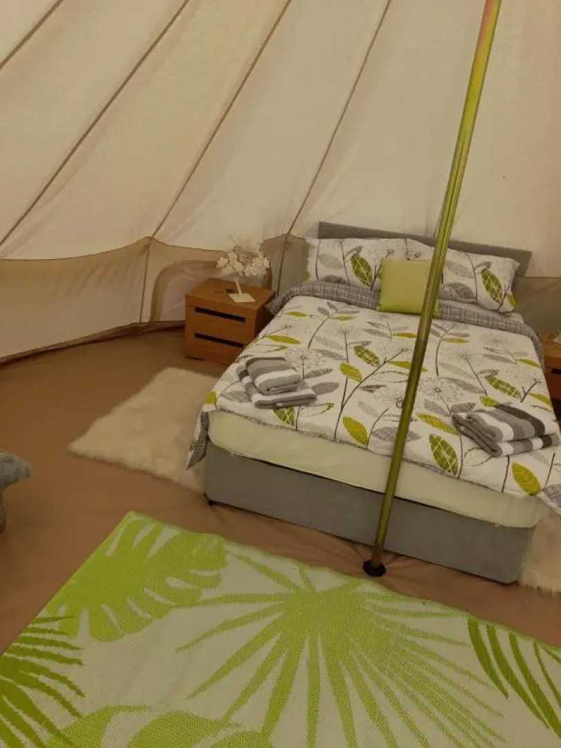 Log cabin retreat and luxury bell tent