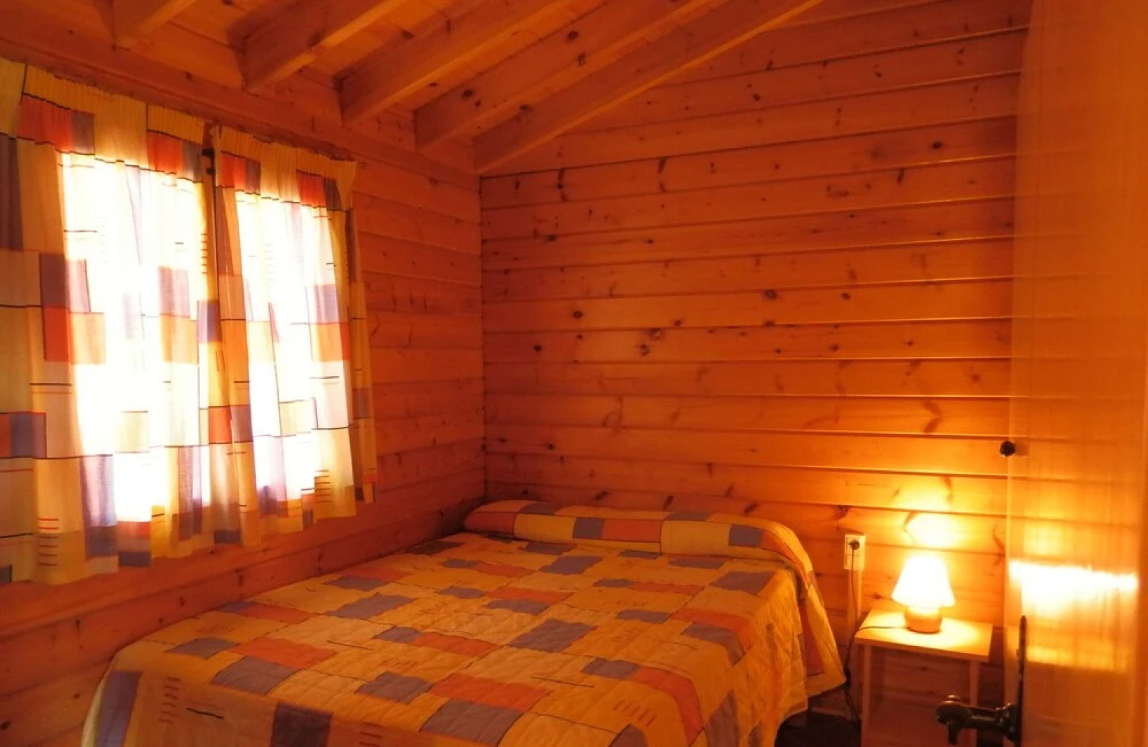 Attractive bungalow with a covered terrace, 1 km. from beach