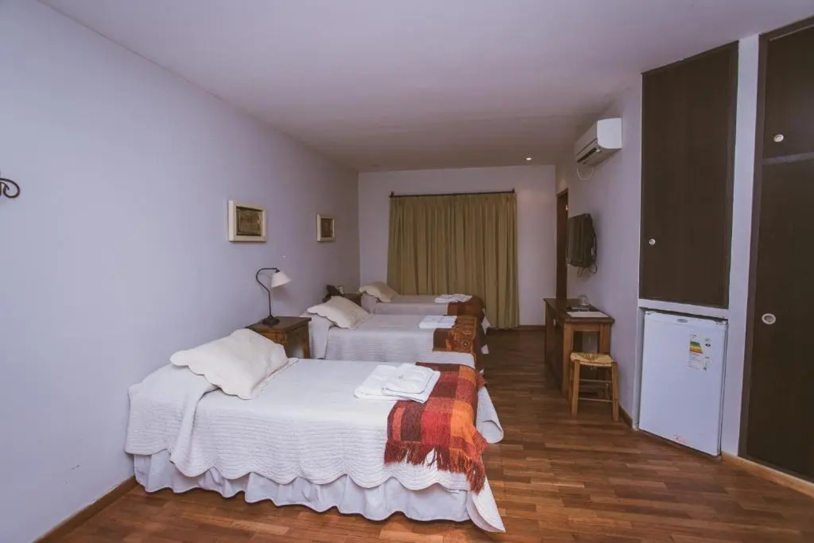 Rio Arriba Suites Apartments y Resto