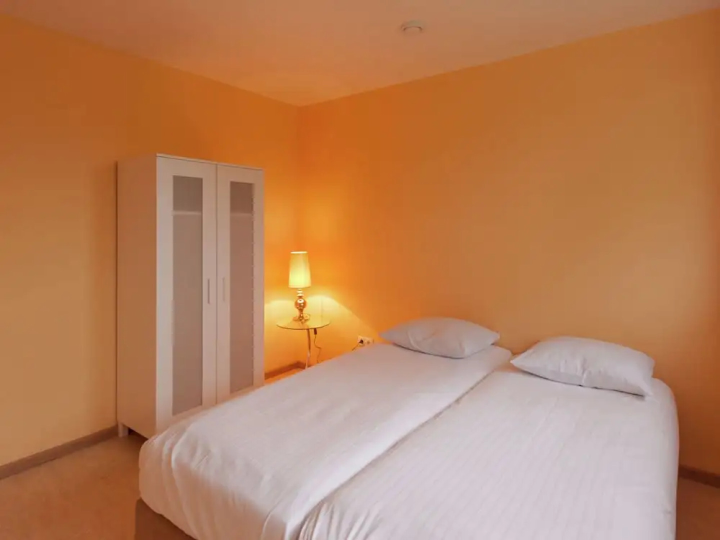 Cozy decorated house with fireplace, surrounded by forest