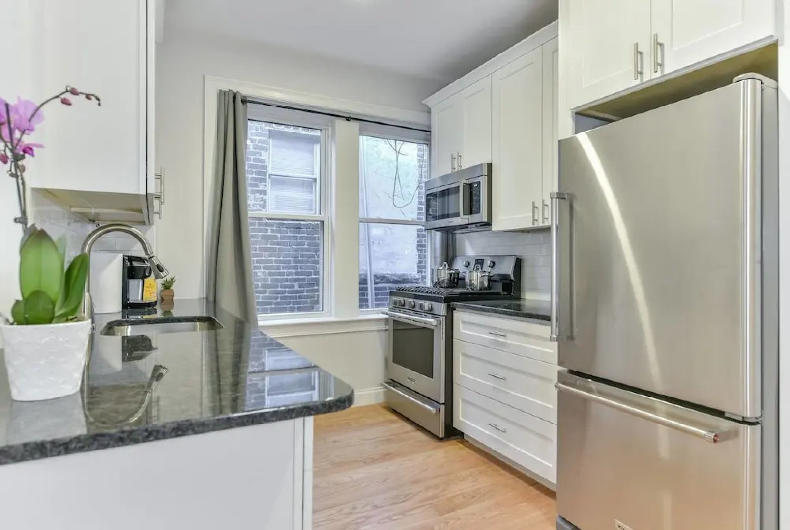 Modern 4br/2ba Condo in North End by Domio
