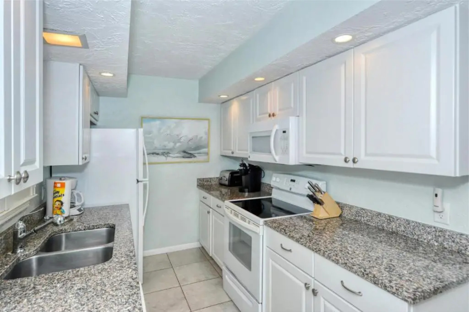 LaPlaya 201C Breathtaking Gulf panorama from this corner end unit with a private stairway to the beach