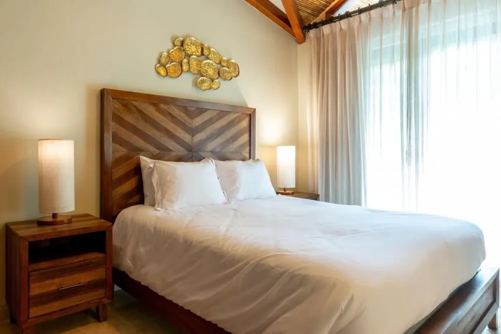 Stylish Split-Level Condo with a Shaded Terrace, Direct Beach Access, and Resort-Style Community Amenities