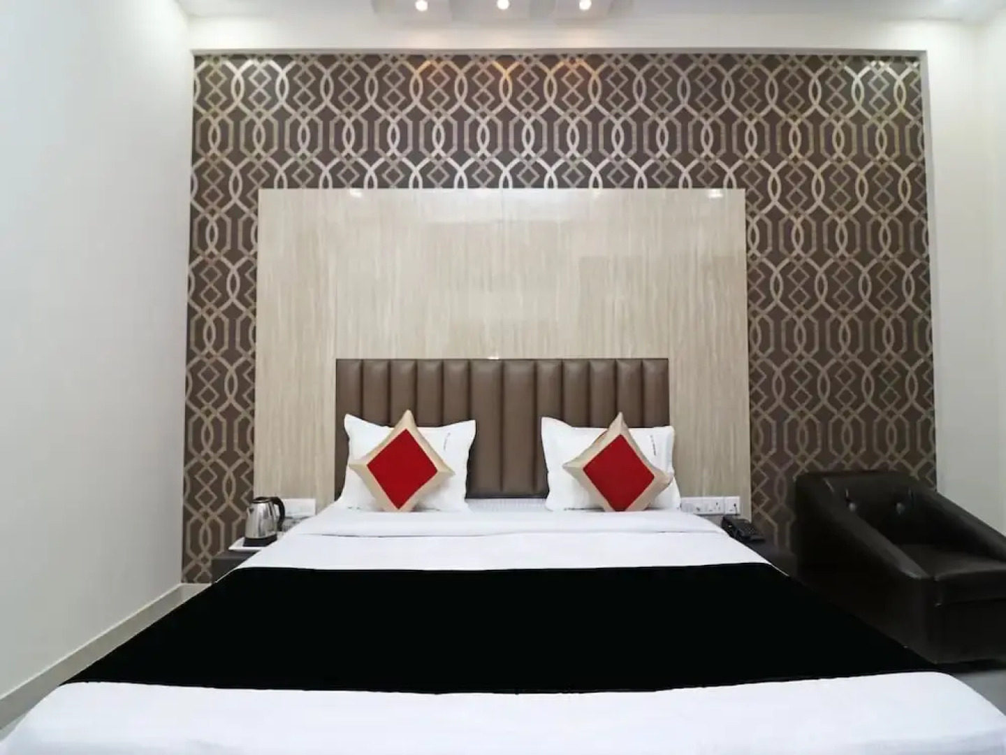 Capital O 19916 The Grand Tilak