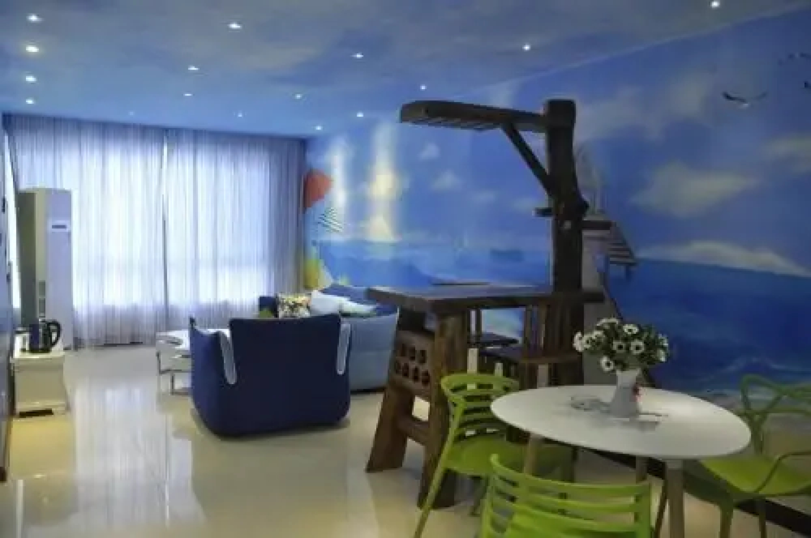 Huazhong Theme Apartment Hotel