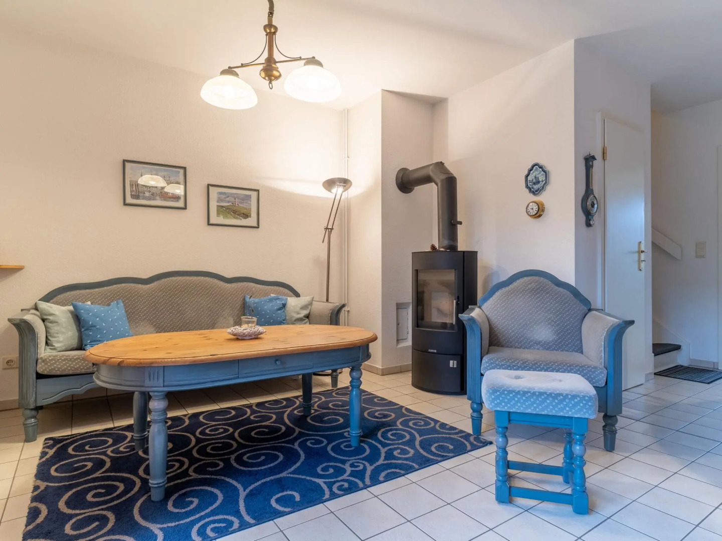 Holiday apartment with a fireplace in a thatched apartment house