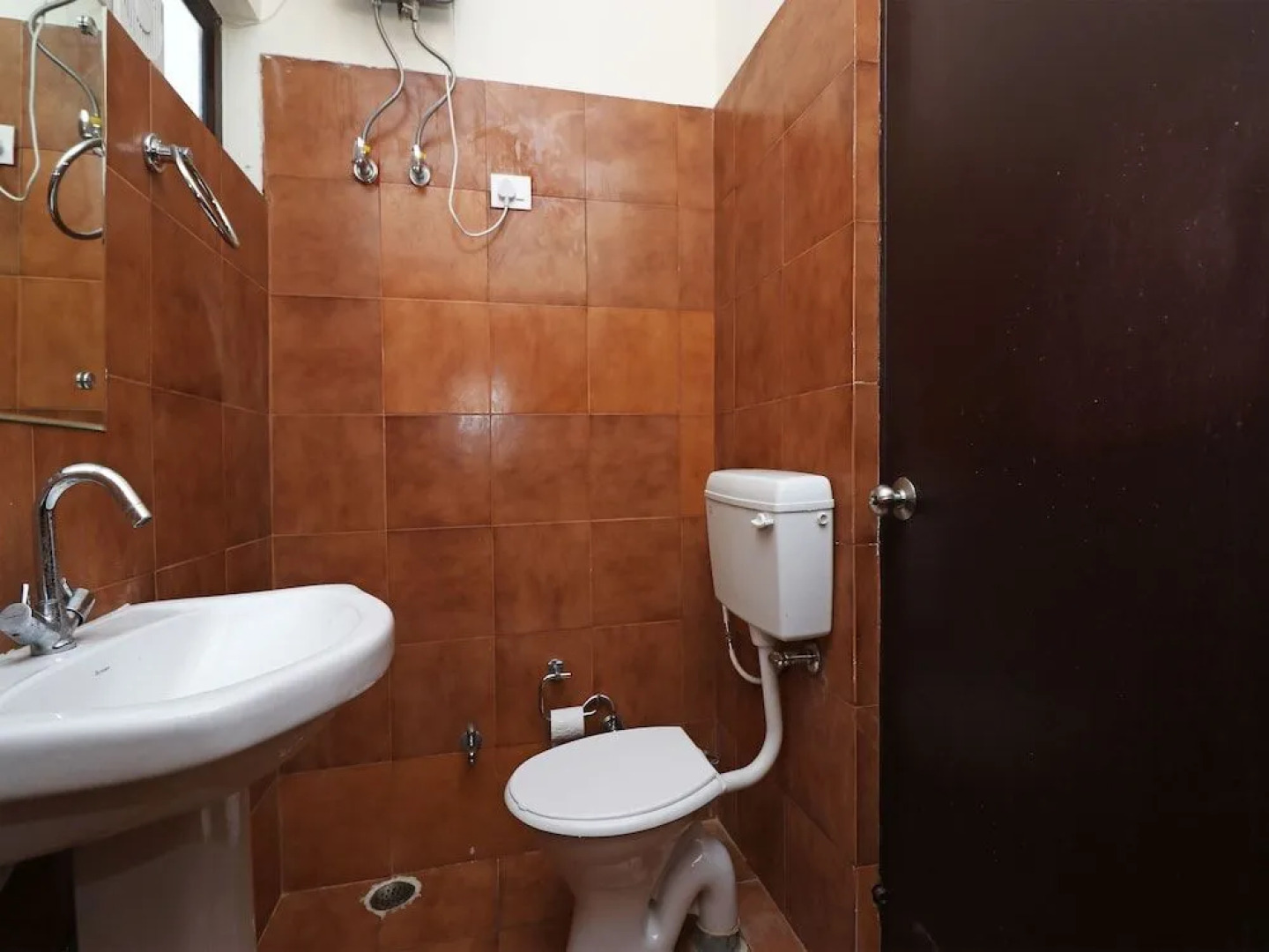 Capital O 27911 Woodland Garden Suites