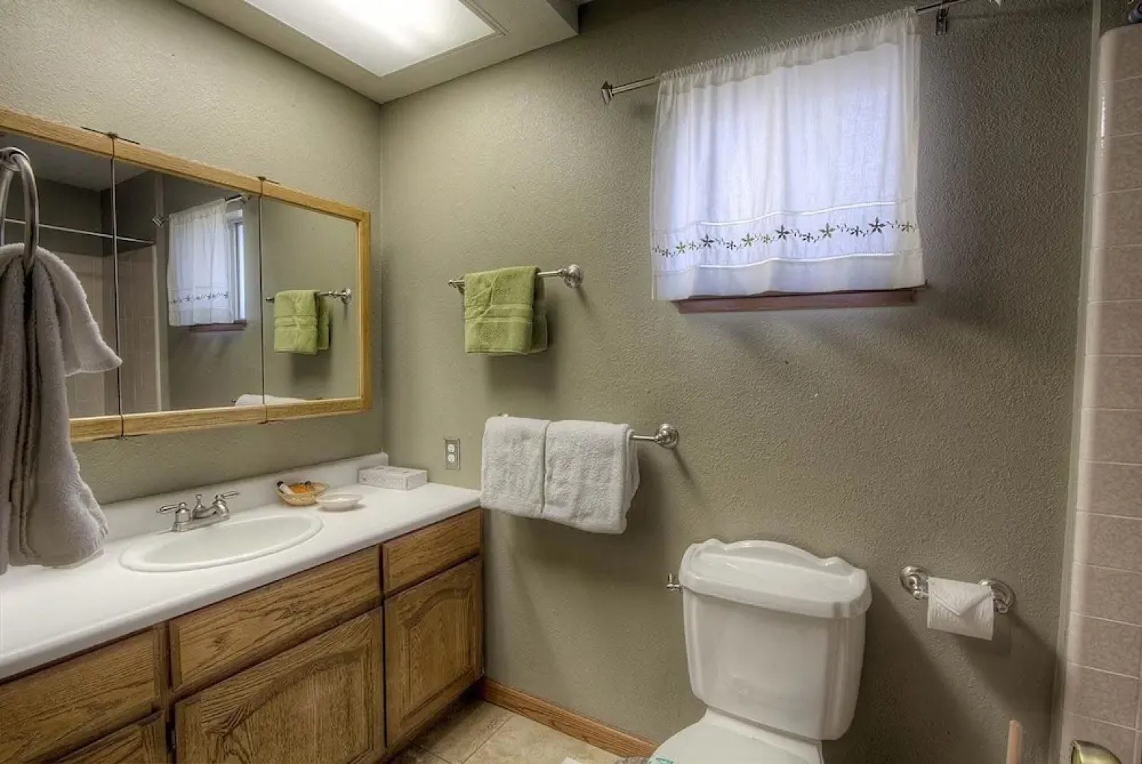 Remodeled Gambrel Style Home with Trees Views by RedAwning
