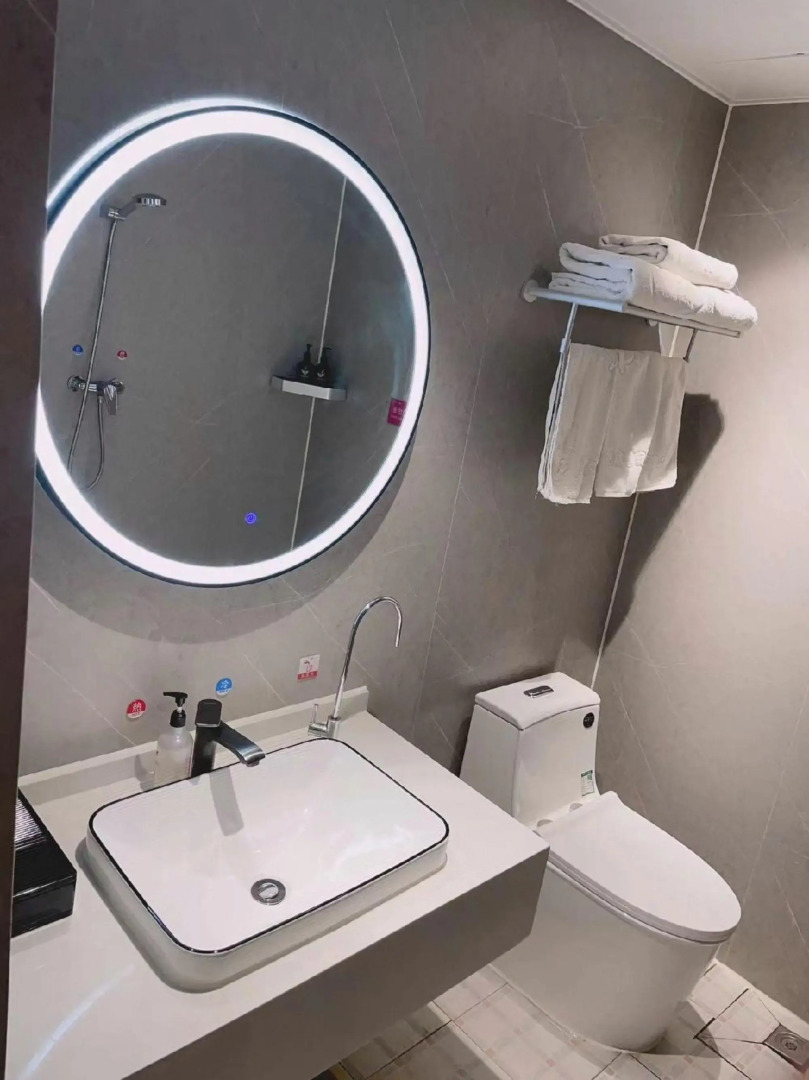 Wanjia Business Hotel (Zaozhuang Maoyuan)