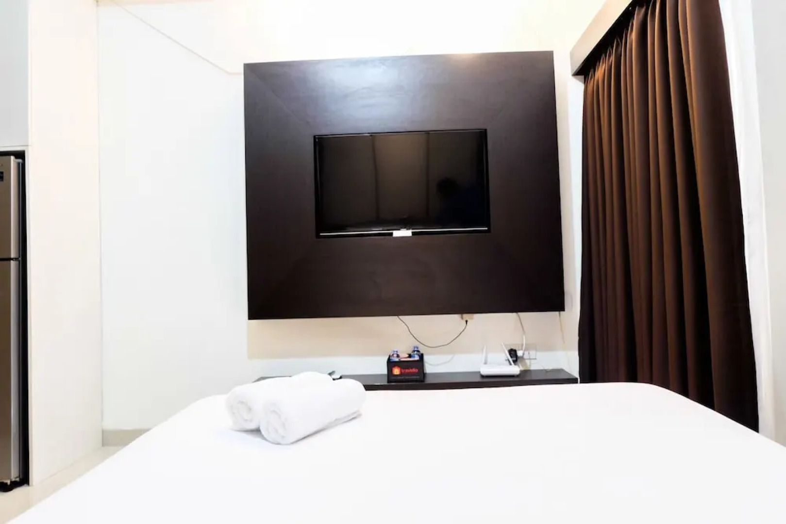 Warm and Homey Studio at The Oasis Cikarang Apartment By Travelio