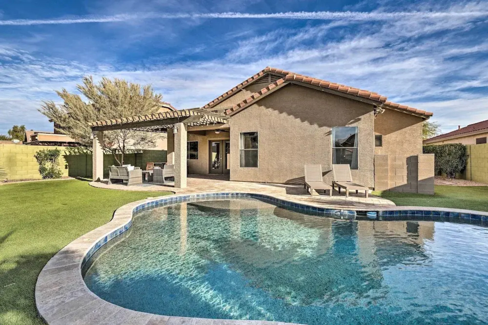 Sun-dappled Goodyear Home: Fire Pit, Pool, Patio