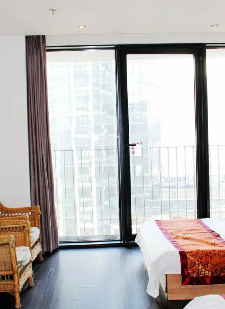 Enji Apartment Hotel Bainianhui - Dalian