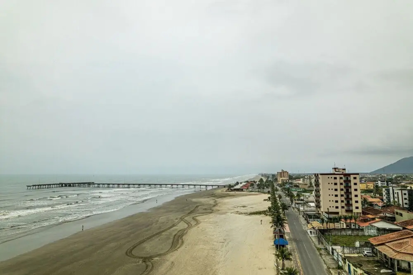 Apto em Mongaguá Prédio frente mar