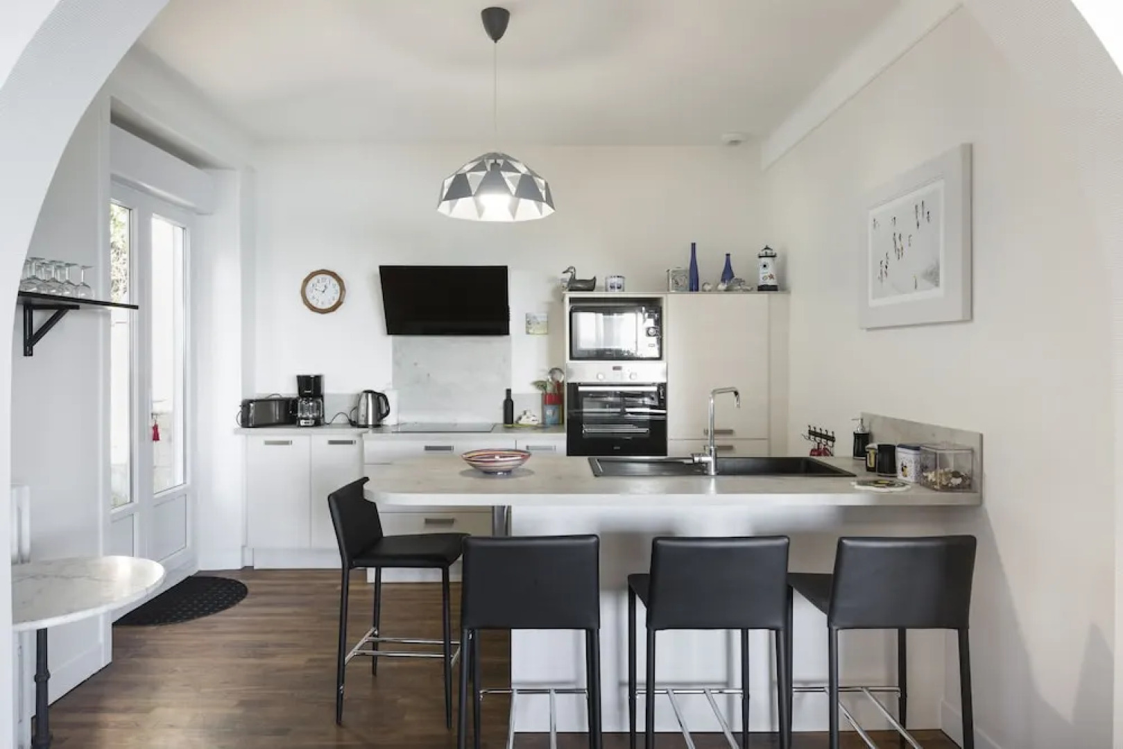 Maison vue mer les pieds dans l'eau