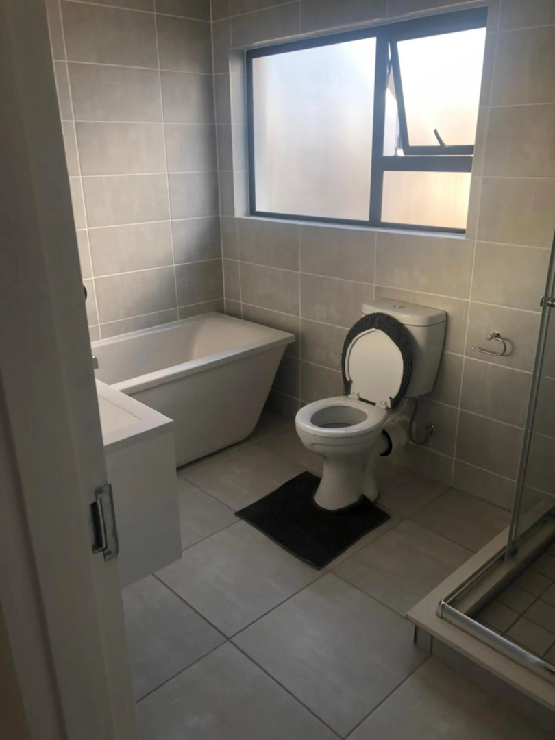 A Coastal/island experience at a Large 2 bed apartment at a Crystal Lagoon Estate.