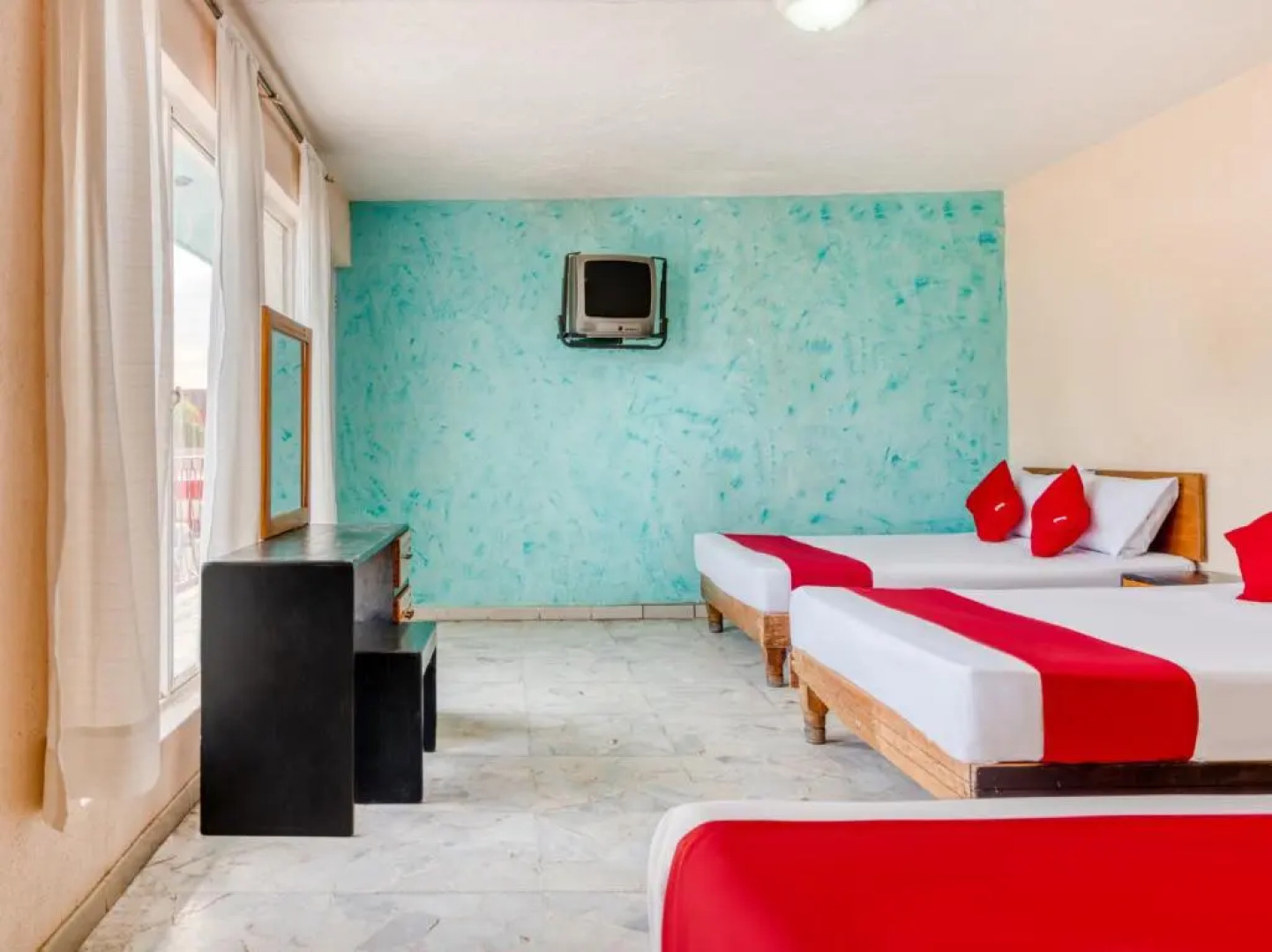 Capital O Hotel La Siesta