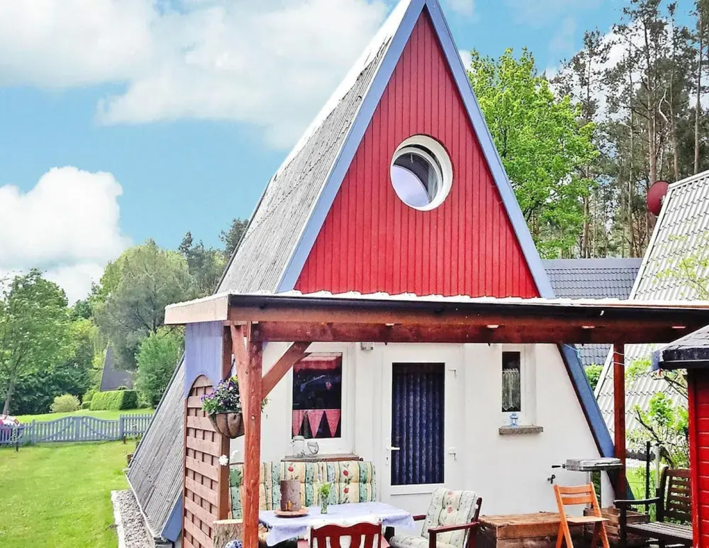 Roof House Near Dummer See With Rowing Boat