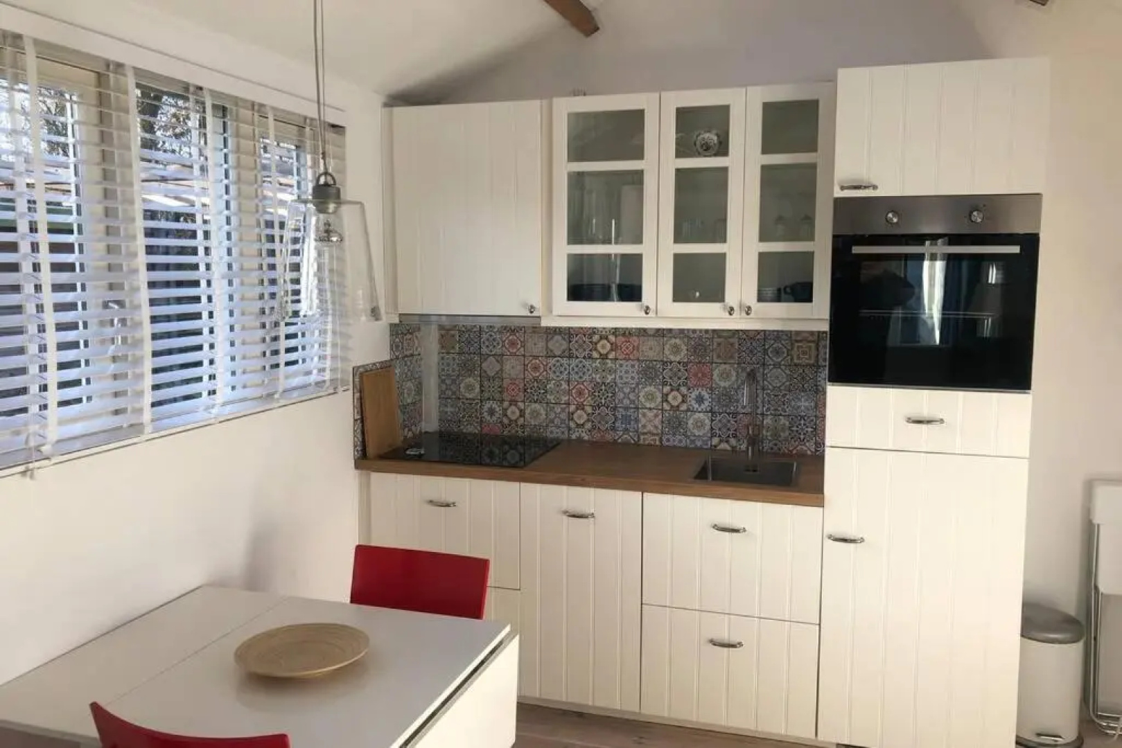 Tiny house in tuin van de statige villa Mariahof