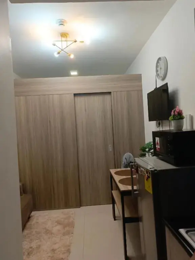 Cozy 1BR with balcony at Fame Residences