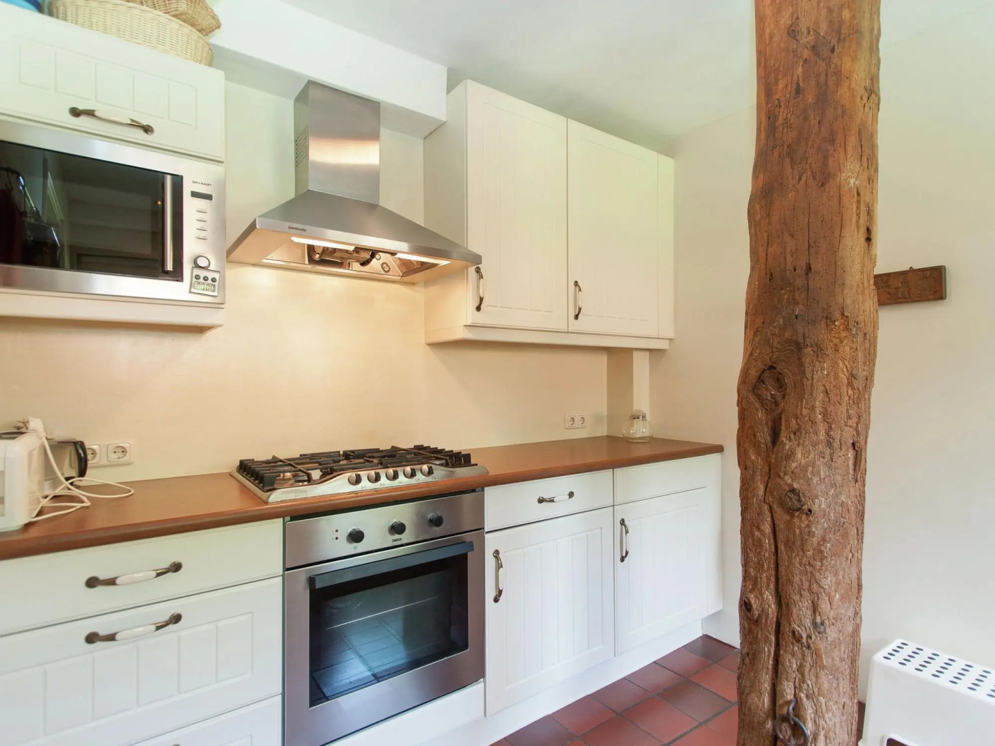 Restored back building of a farm.