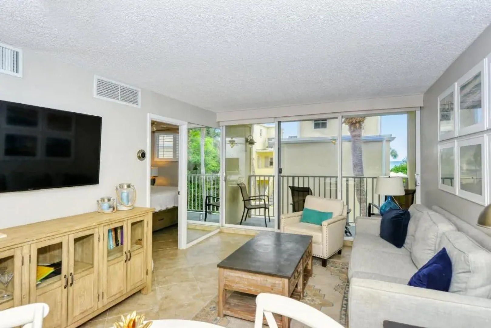 LaPlaya 202E Catch the gentle Gulf breezes on your private balcony beneath the swaying palms