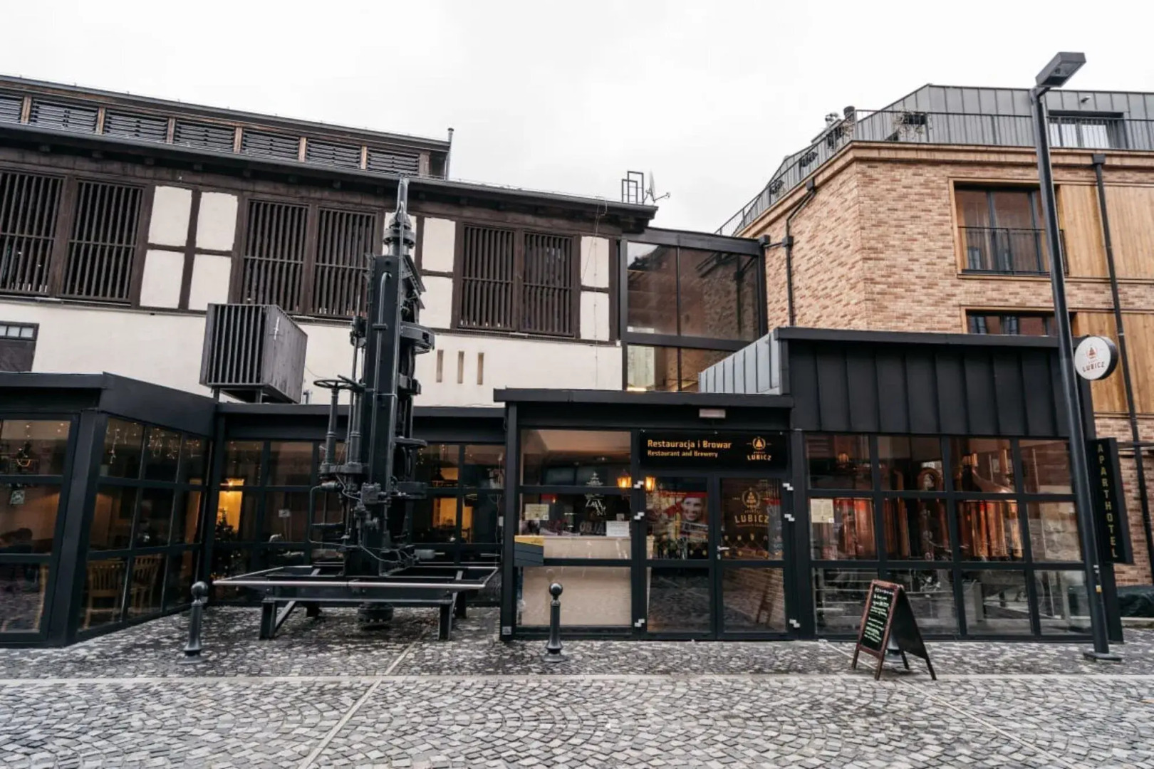 Modern and Industrial Apartment in Historic Brewery by the Old Town