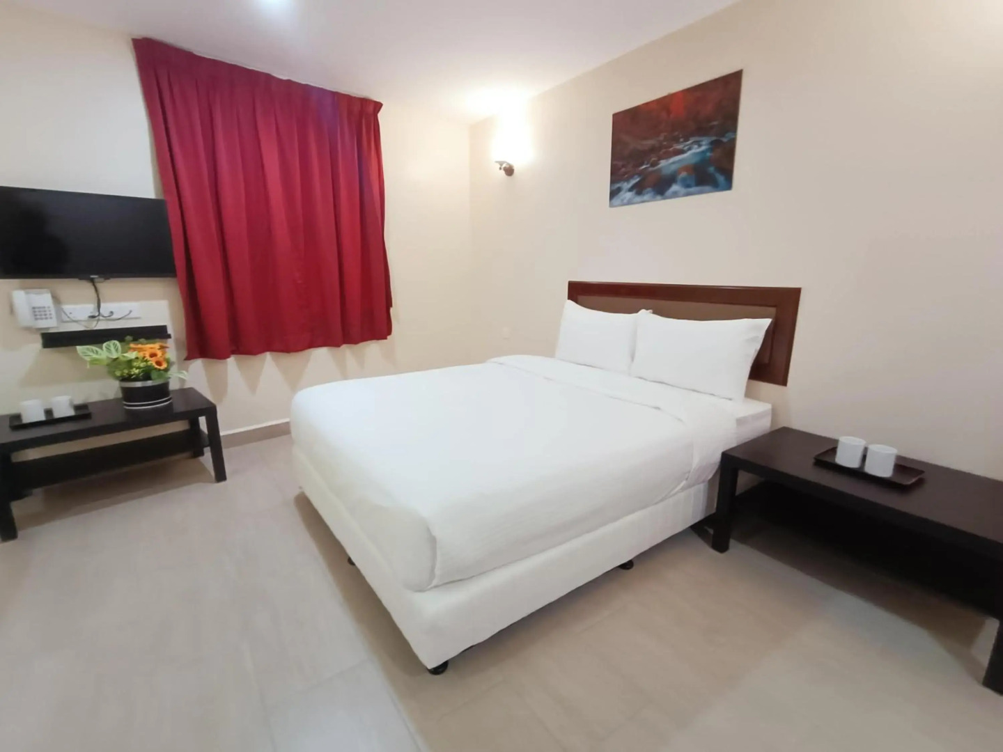 Capital O 90897 Island City Hotel