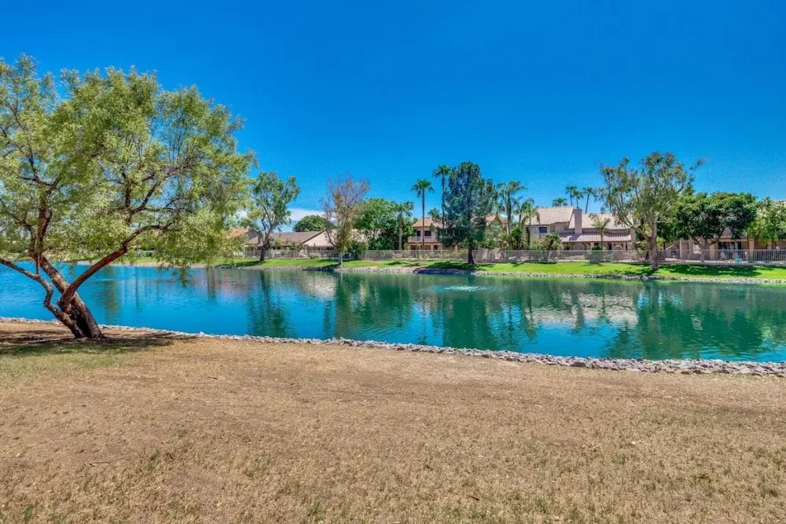 Updated Waterfront Home W/ Private Heated Pool & Garage. Near Arrowhead Shops! By Redawning