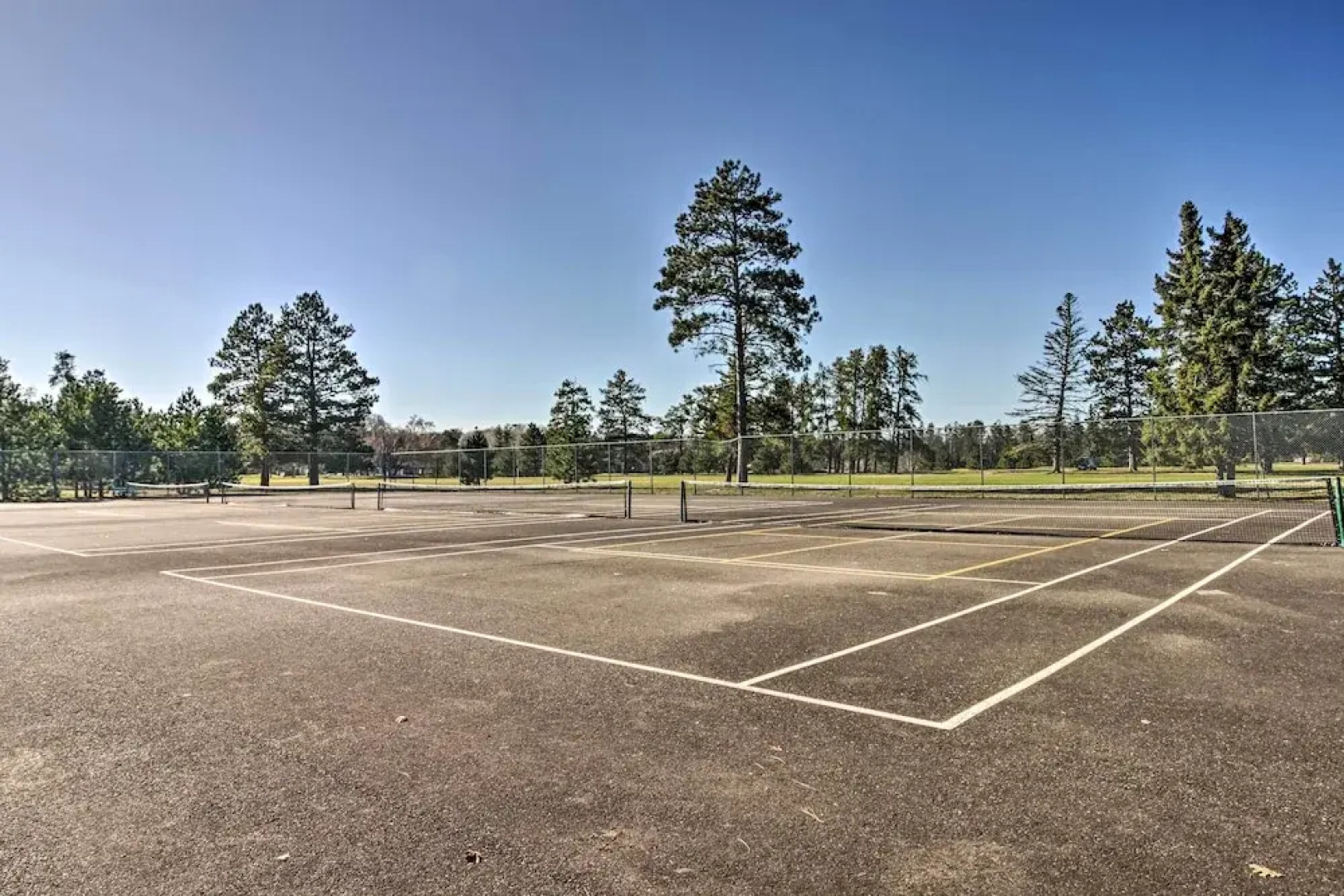 1 Mi to Beach & Lake: Breezy Point Cabin w/ Yard!