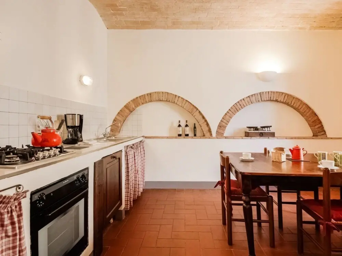 small village of beautiful apartments in the green Tuscan hills and olive groves