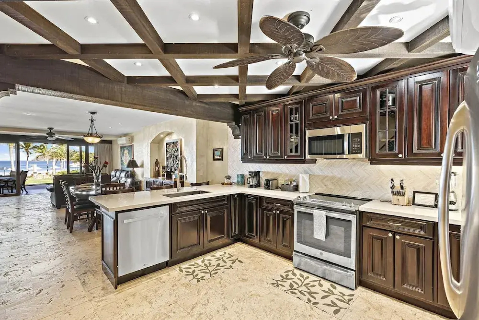 Luxury Beachfront Condo w/ High-End Wood Furnishings and Ocean Views in Exclusive Community