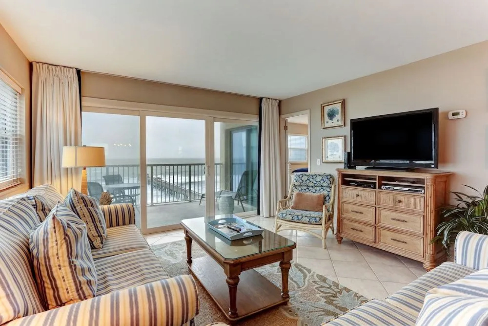 North End Corner Unit with View of the Ocean and Miles of Sandy Beach by RedAwning