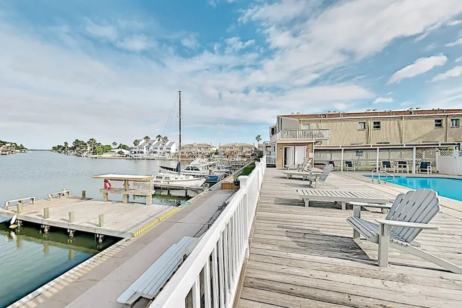 Lovely Canal-front W/ Pools & Boat Slip 2 Bedroom Condo