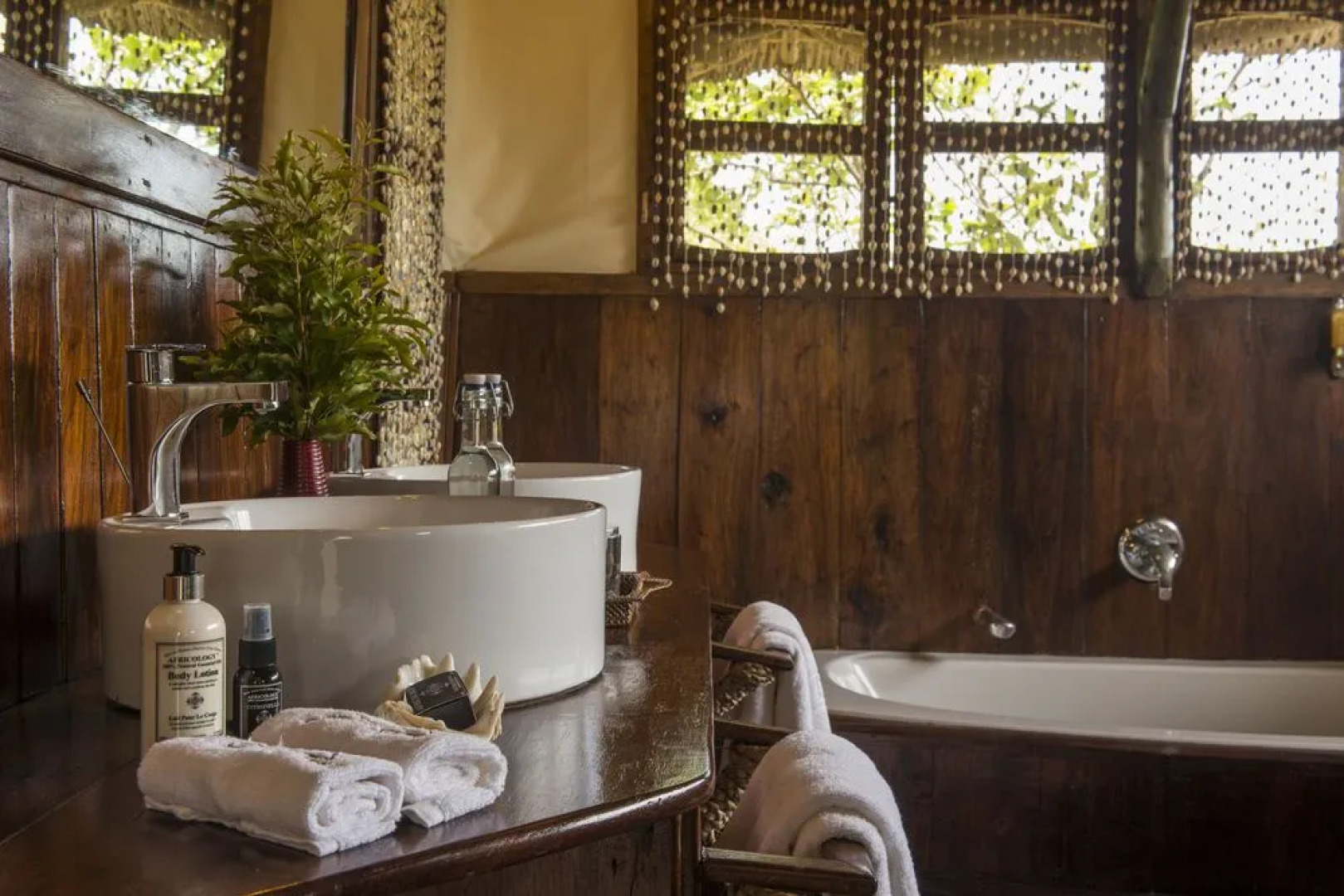 Saadani Safari Lodge - bush, river, beach