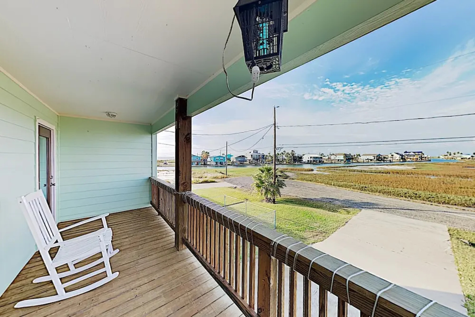 Canal-front Getaway W/ Enclosed Deck & Boat Dock 4 Bedroom Home