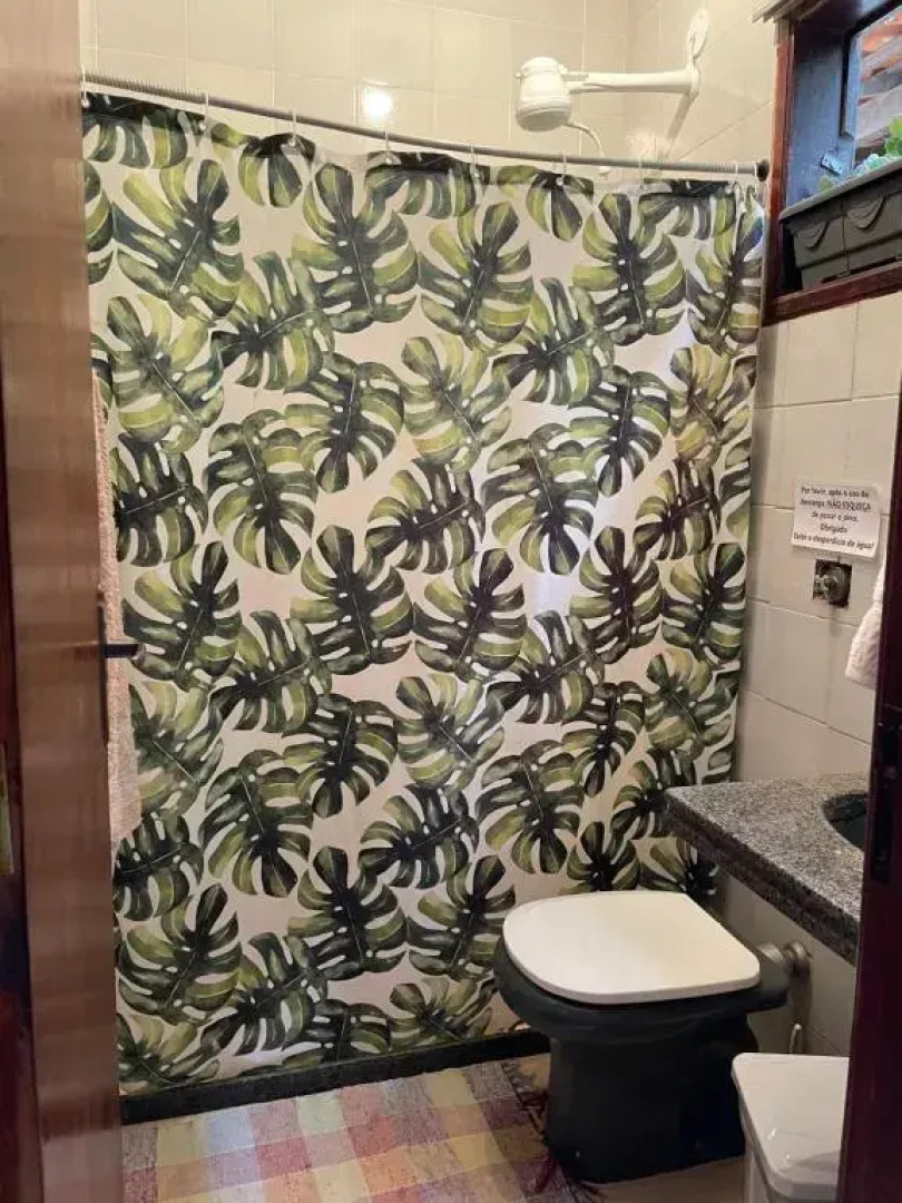 Suíte com varanda vista piscina